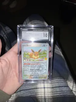 🔥2025 Prismatic Evolutions EEVEE Pokemon Day Promo 074/131 Holo CGC 10 GEM MINT - Image 1