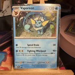 Vaporeon 168 HOLOBLEED/SWIRL Prismatic Evolutions Black Star Pokemon TCG MINT - Image 1