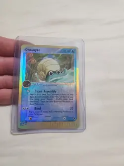 DAMAGED Omanyte 70/100 - Sandstorm Reverse Holo Rare Pokemon Card - Image 1