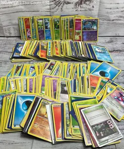 Pokemon TCG Common Holographic Lot of 50 Plus Trading Cards - Image 1
