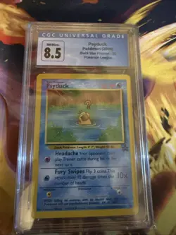 2000 WOTC POKEMON LEAGUE PSYDUCK #20 NON-HOLO BLACK STAR PROMO PSA 8 NM-MT - Image 1