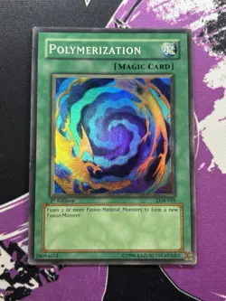 Yugioh Polymerization LOB-059 Super Rare 1st Edition LP Small Foil Shift - Image 1