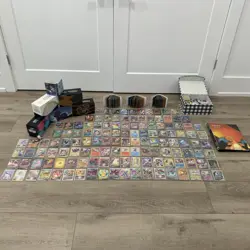 Complete Pokemon Collection with Unique Cards, Portfolios, and Collectible Boxes - Image 1