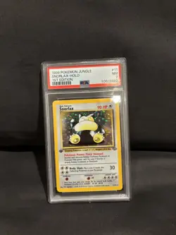 1999 POKEMON JUNGLE 1ST ED #11 SNORLAX-HOLO PSA 7 - Image 1