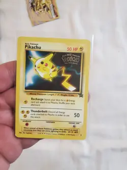 DAMAGED Pokemon TCG Pikachu #4 Stamped 1999 WB Movie Black Star Promo Card - Image 1