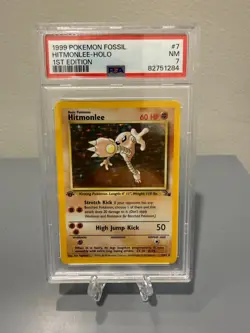1999 POKEMON FOSSIL 1ST ED #7 HITMONLEE-HOLO PSA 7 - Image 1