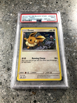 Pokemon TCG Cards Eevee SM235 Black Star Promo Holo PSA 9 MINT - Image 1