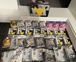 Pokemon lot of 30 mini portfolios sealed + celebrations lunchbox Sword Shield - Image 1