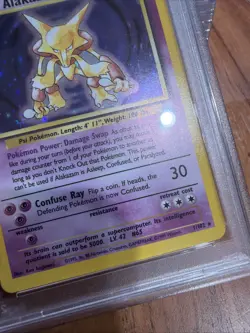 1999 POKEMON GAME #1 ALAKAZAM-HOLO PSA 7 - Image 4