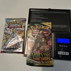 Pokemon Sealed Booster Pack Bundle, Evolving Skies Heavy & Prismatic Evolutions - Image 1