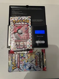 Pokemon Prismatic Evolutions Heavy Pack 22.8g + 151 Booster Pack Bundle of 2 - Image 1