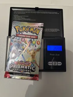 Pokemon Prismatic Evolutions Heavy Pack 22.8g + 151 Booster Pack Bundle of 2 - Image 2