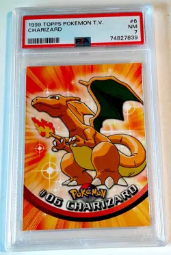 1999 TOPPS POKEMON CHARIZARD #6 PSA 7 1ST EDT BLUE LOGO - Image 1