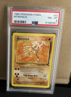 1999 Pokemon Fossil Hitmonlee #22 PSA 8 - Image 1