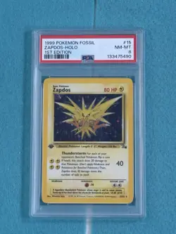 1999 Pokemon Fossil Zapdos Holo 1st Edition #15 PSA 8 - Image 1