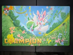 Official Pokemon Champion playmat featuring Gardevoir and Sylveon from cups - Image 1