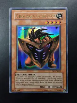 YUGIOH 2004 | BIG SHIELD GARDNA | DB1-DE097 | GERMAN | ULTRA RARE | GD (DAMAGED) - Image 1