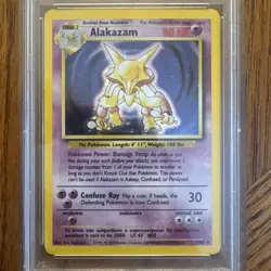 1999 Pokemon Base Set Holo Alakazam #1 trading card (PSA) as Near Mint-Mint 8 - Image 2