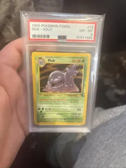 1999 Pokemon Fossil PSA 8 - Image 1