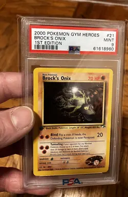Vintage (2000) 1st Edition Brock’s Onix 21/132 Pokemon TCG Gym Heroes PSA 9 MINT - Image 1
