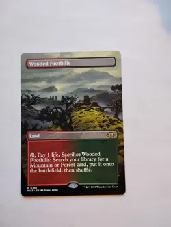 Wooded Foothills (Borderless) Modern Horizons 3 Regular - Image 1