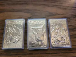 Burger King Pokemon Gold Metal Card, Charizard X2 & Pikachu - Image 1