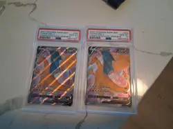Pair of PSA 10 Charizards — 2020 Pokemon SWSH — Champions Path — Charizard V - Image 1