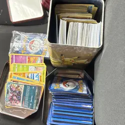 Pokemon Mixed Card Lot Pikachu Hydreigon Lapras Ledbya Cutiefly English Holo Tin - Image 1