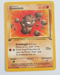 Pokemon Karte Kleinstein 47/62 Fossil 1. Edition Deutsch NM - Image 1