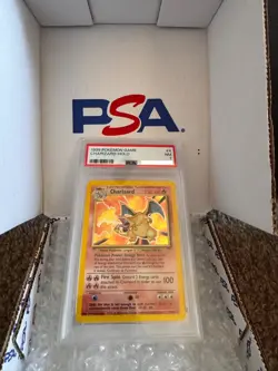 1999 POKEMON BASE SET UNLIMITED #4 CHARIZARD-HOLO PSA 7 - Image 1