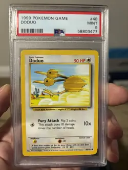 1999 Pokemon Base Set Doduo #48 PSA 9 - Image 1