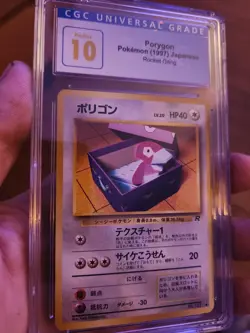(POP 3) CGC 10 PRISTINE 1997 Pokemon Japanese Rocket PORYGON #137 - Image 1
