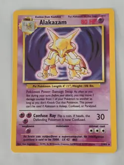 ALAKAZAM 1999 Pokemon Base Set Unlimited Holo Rare Card #1/102 - Image 1