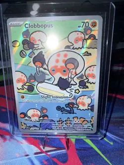 Clobbopus 207/191 Illustration Rare Pokemon SV Surging Sparks Near Mint - Image 1