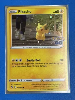 Pikachu (Cosmos Holo) Pokemon GO 027/078 Common Pokemon NM + Card Saver - Image 1