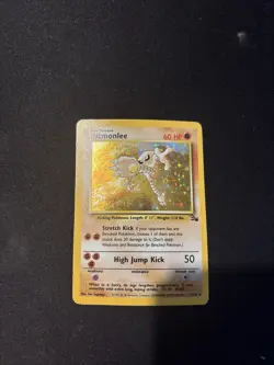 Hitmonlee 7/62 Base Set Fossil Set Holo Pokemon Card | Near MINT - Image 1