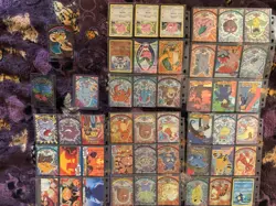 1999 topps pokemon cards (48 ct.) including blue topps charizard + film cards - Image 1