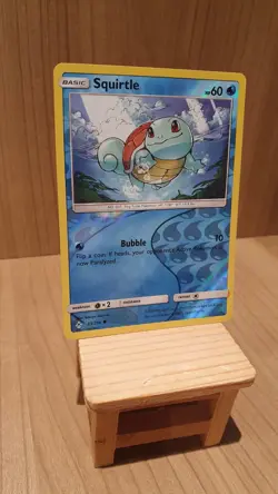 Squirtle 33/214 - Unbroken Bonds - Reverse Holo Pokemon Card - Good Condition - Image 2