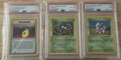 Pokemon Base Set First Edition PSA lot. Nidoran Tangela & Devolution Spray - Image 1