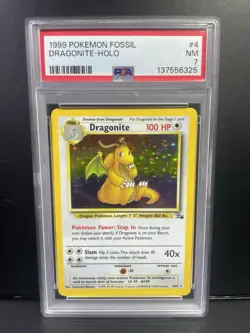 1999 POKEMON FOSSIL #4 DRAGONITE-HOLO PSA 7 - Image 1
