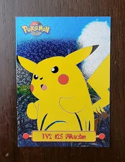 DMG! Pikachu TV2 #25 Topps Series 1 - Textured FOIL Black Logo Pokemon TCG - Image 1
