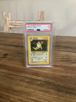 1999 POKEMON BASE SET UNLIMITED #14 RAICHU-HOLO PSA 7 - Image 1