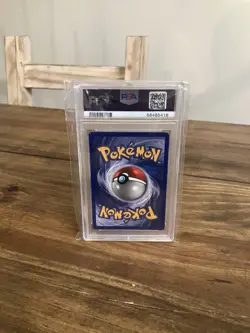 1999 POKEMON BASE SET UNLIMITED #14 RAICHU-HOLO PSA 7 - Image 2