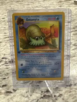 1999 Pokemon Fossil Omanyte 52/62 1st Edition NM WOTC Vintage Card - Image 1
