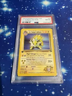 First Edition 2000 Pokemon Gym Challenge 28/132 Lt. Surge's Jolteon PSA 8 - Image 1