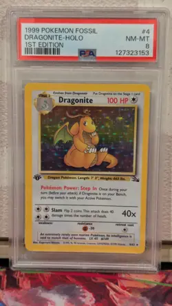 1999 Pokemon Fossil - Dragonite Holo 1st Edition PSA 8 - Image 1