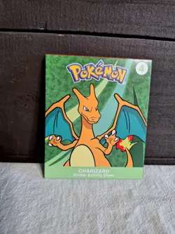 UNOPENED!! 2025 McDonald's Happy Meal Pokemon Pack; #4 Charizard; Factory Sealed - Image 1