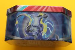 POKEMON TCG KORAIDON EX TIN SEALED SMALL DENT ON SIDE OF EX - Image 5