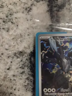 Possible 10 graded. Pokemon N’s Zekrom Holo 031 Ascended Heroes ETB Promo NM+ - Image 5