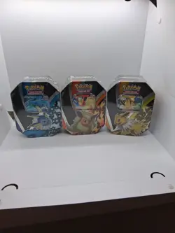 Pokemon TCG: Eevee Evolutions Tin (Set Of 3) Jolteon/Vaporeon/Flareon English - Image 1